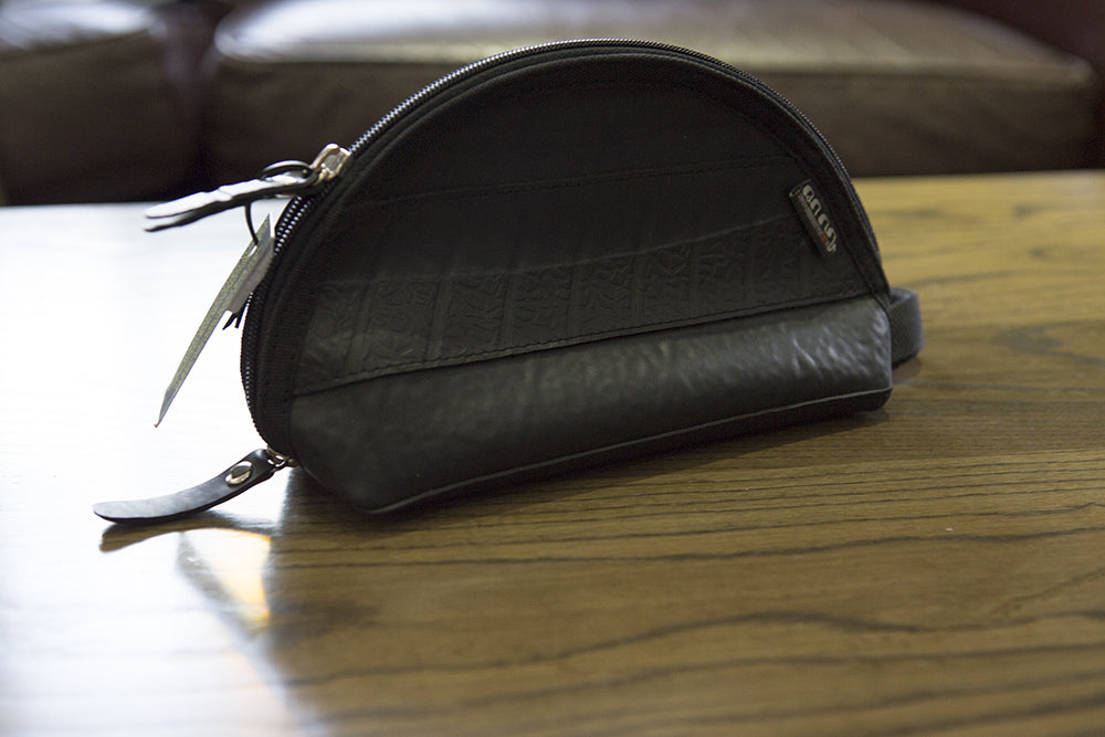 Ness Multipurpose Inner Tube Vegan Travel Pouch in six colors, showcasing its unique texture and handcrafted design.